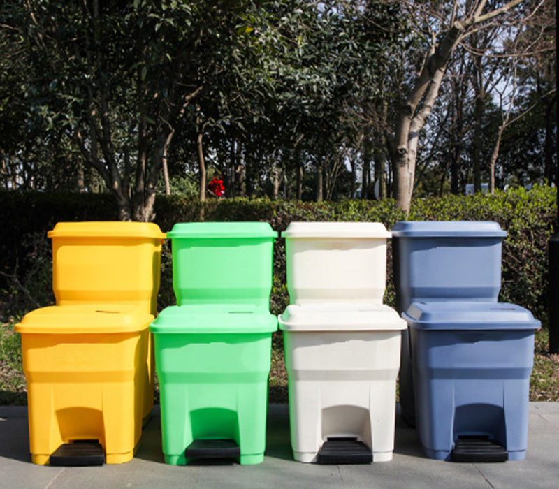 black plastic bathroom bin
