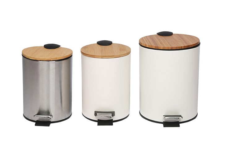 green metal trash can